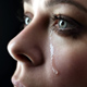 Почему при сильных эмоциях человек плачет?