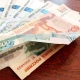 Курянин в Интернете продавал поддельные купюры
