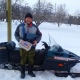 В Курской области почтальон доставляет газеты и продукты старикам в деревнях на снегоходе