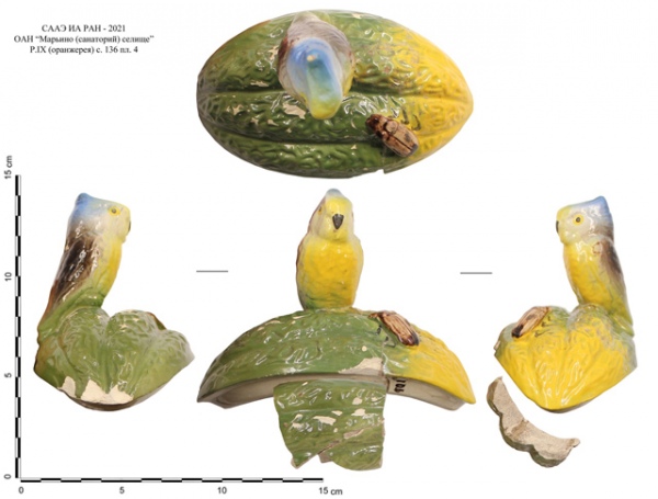 Фрагмент сахарницы в виде попугая на орехе. Датируется концом XIX – началом XX века