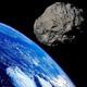 Астероид размером с автобус пролетел рекордно близко от Земли