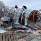 В Курске на улице Дзержинского меняют покрытие надземного пешеходного перехода